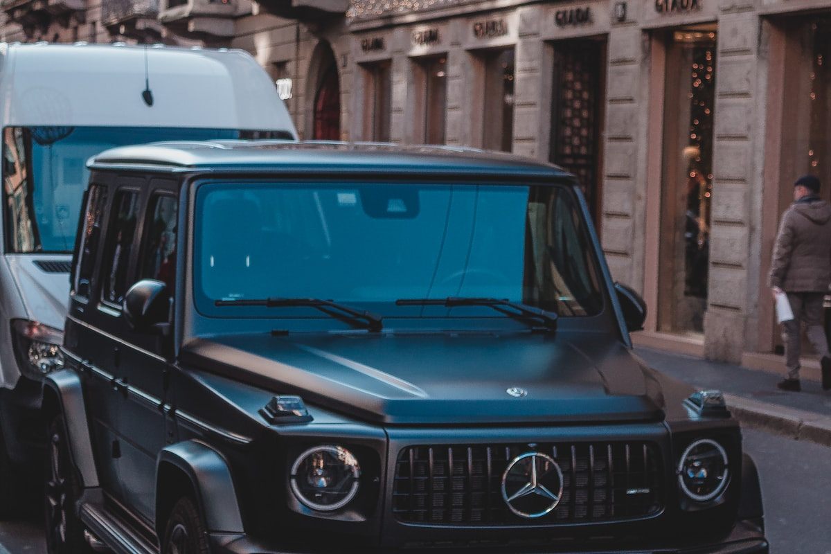 Black Mercedes-Benz G-Class parked on a city street