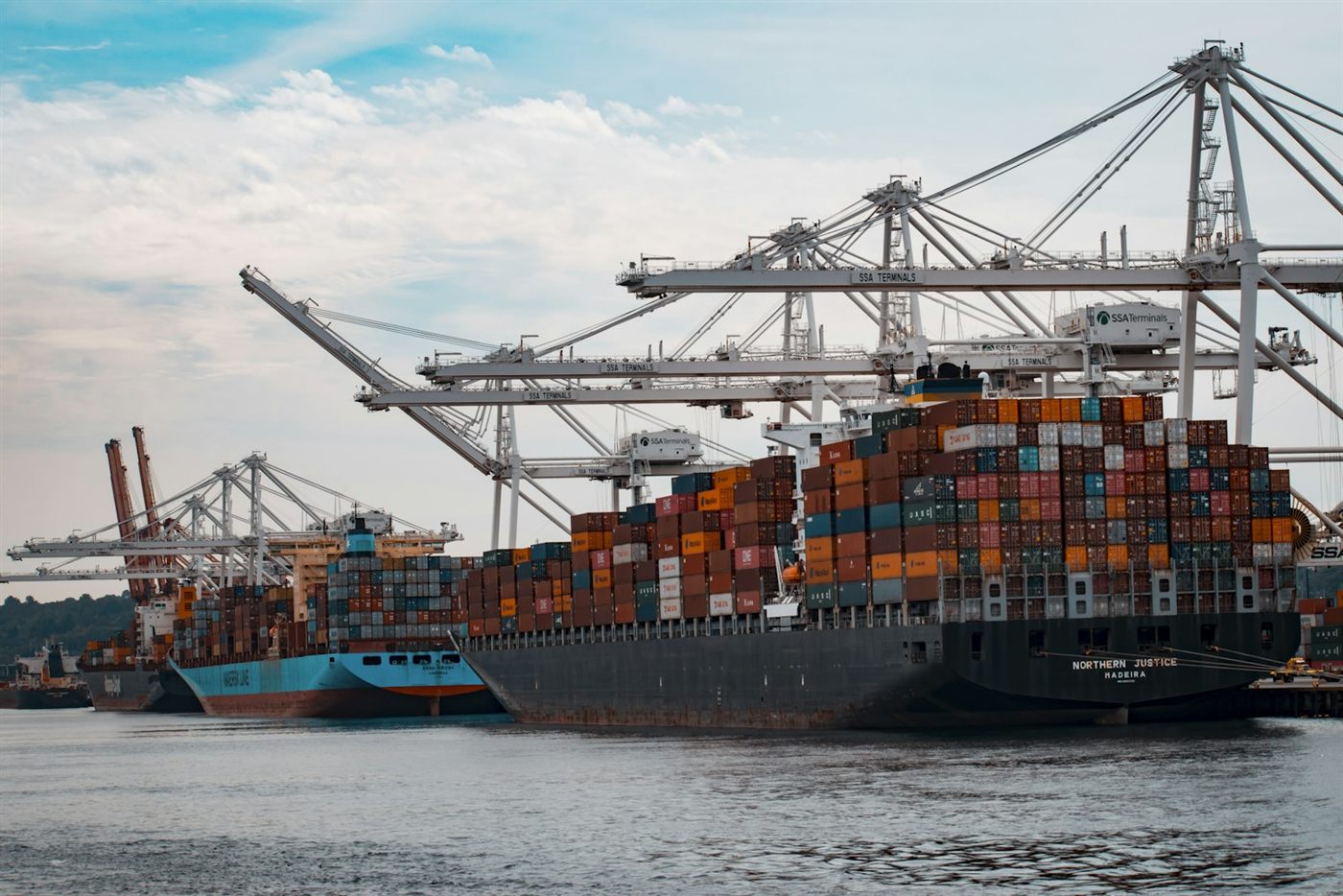Gantry cranes working a container vessel at port